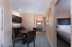 Ένα ή περισσότερα κρεβάτια σε δωμάτιο στο Prestige Cranbrook Hotel, BW Premier Collection