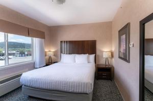 Ένα ή περισσότερα κρεβάτια σε δωμάτιο στο Prestige Cranbrook Hotel, BW Premier Collection