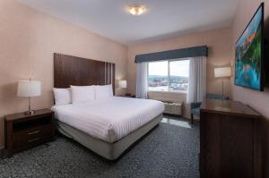 Ένα ή περισσότερα κρεβάτια σε δωμάτιο στο Prestige Cranbrook Hotel, BW Premier Collection