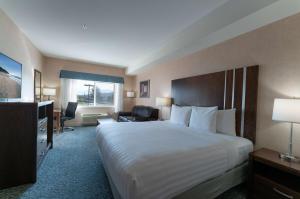 Ένα ή περισσότερα κρεβάτια σε δωμάτιο στο Prestige Cranbrook Hotel, BW Premier Collection