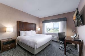 Ένα ή περισσότερα κρεβάτια σε δωμάτιο στο Prestige Cranbrook Hotel, BW Premier Collection