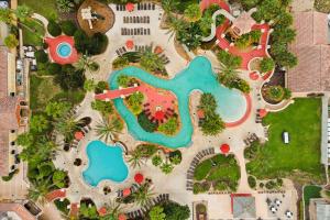 an overhead view of a pool at a resort at Resort w Lazy River and Arcade 30mis to Disney in Davenport