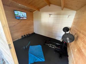 an overhead view of a room with a gym at La Passerelle in Saint-Hilarion