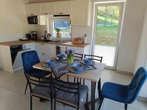 A cozinha ou kitchenette de Biały Domek
