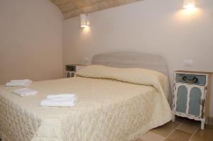 En eller flere senge i et værelse på CASA santa Caterina 38