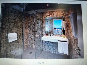 Een badkamer bij HOTEL FLAMINGO CLUB