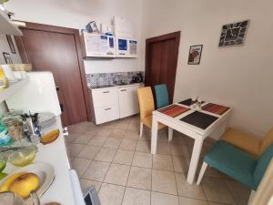 Kuchyň nebo kuchyňský kout v ubytování Patrizia Casa Vacanze