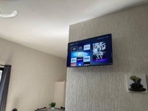 TV i/ili multimedijalni sistem u objektu Excelente Loft Céntrico