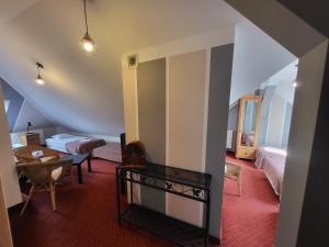 Posteľ alebo postele v izbe v ubytovaní Apartamenty Amadeus