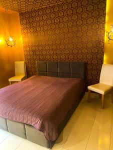 เตียงในห้องที่ Turzyn Apartament: Idealne miejsce na Twój wypoczynek