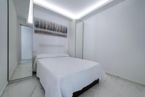 Postel nebo postele na pokoji v ubytování Villa Monarca