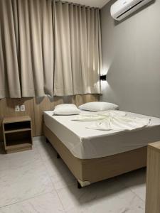 Postel nebo postele na pokoji v ubytování Hotel Minorus