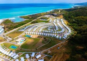 an aerial view of a park next to the ocean at SeaJam Vacation Home between Negril & Montego Bay in Point