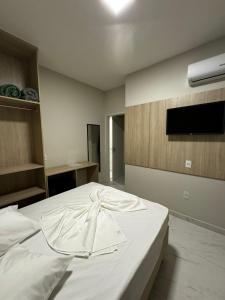 Postel nebo postele na pokoji v ubytování Hotel Minorus
