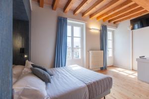 Кровать или кровати в номере Albergo Del Sole