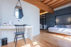 Кровать или кровати в номере Albergo Del Sole