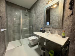 Kúpeľňa v ubytovaní Apartamentos Mk77 León- San Isidoro