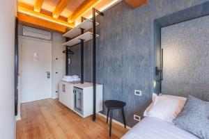 Кровать или кровати в номере Albergo Del Sole