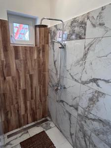Kúpeľňa v ubytovaní Bódva Apartman
