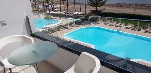 a view of a swimming pool in a hotel at Cura Marina Premium in Mogán