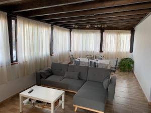 a living room with a couch and a table at Edificio Juan Ávila cabrera in Gran Tarajal