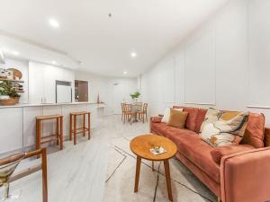 Et opholdsområde på Charming 1 Bedroom Apartment in Auckland