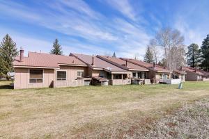a large house with a large yard at Cozy Mtn Condo with Grill, 28 Mi to Wolf Creek! in Pagosa Springs