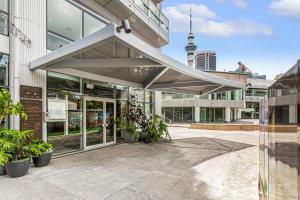 a building with awning in front of a building at At the cultural heart of Auckland CBD in Auckland