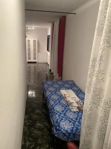 Ένα ή περισσότερα κρεβάτια σε δωμάτιο στο Edificio Juan Ávila cabrera