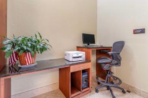 an office with a desk with a computer and a chair at Best Western Plus Knoxville Cedar Bluff in Knoxville