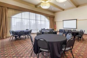 a conference room with tables and chairs and a screen at Best Western Plus Knoxville Cedar Bluff in Knoxville +33 photos