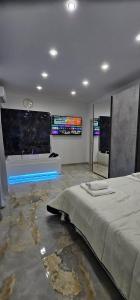 Кровать или кровати в номере Da Tonino luxury apartments