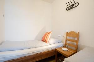 Ein Bett oder Betten in einem Zimmer der Unterkunft Berliner Hof - HOF/210