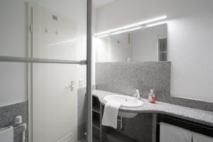 Ein Badezimmer in der Unterkunft Berliner Hof - HOF/210