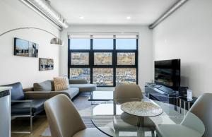 Posezení v ubytování Dharma Home Suites Hoboken