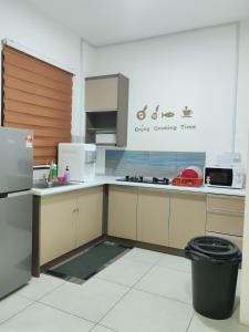 a kitchen with a sink and a counter top at Dreamstay36 3R2B 8pax Meritus perai in Perai