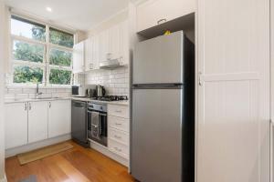 A cozinha ou cozinha compacta de Quiet Woollahra Apartment