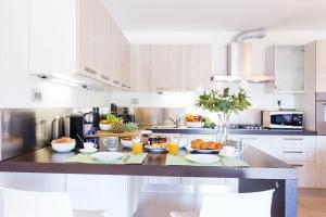 A kitchen or kitchenette at Italian Lakes villa with lake views