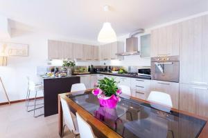 A kitchen or kitchenette at Italian Lakes villa with lake views