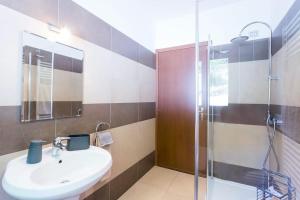 A bathroom at Italian Lakes villa with lake views