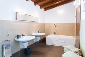 A bathroom at Italian Lakes villa with lake views
