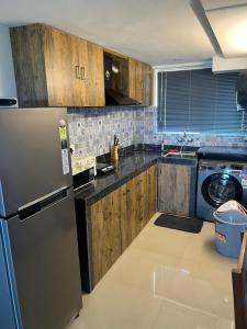 A kitchen or kitchenette at The Nautical Nest - Para House