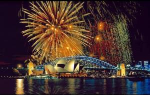 a fireworks display over the sydney opera house and the sydney harbour at Studio Gem With Rooftop Space Prime Location in Sydney