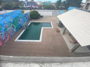 Výhled na bazén z ubytování Casa com piscina em Itamaracá nebo okolí