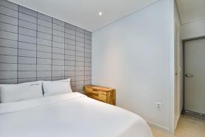 Postel nebo postele na pokoji v ubytování Ciel mini hotel