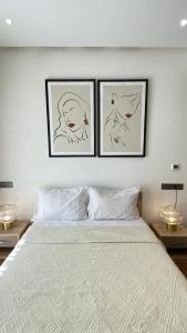 Un pat sau paturi într-o cameră la Maârif Cosy Apartment - Dynasty Estate