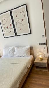 Voodi või voodid majutusasutuse Maârif Cosy Apartment - Dynasty Estate toas