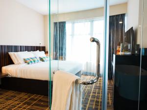 Postel nebo postele na pokoji v ubytování Starus Hotel Bukit Bintang