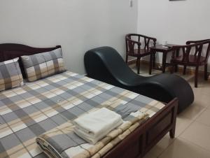 Postel nebo postele na pokoji v ubytování Sứ Lạng Hotel