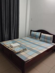 Postel nebo postele na pokoji v ubytování Sứ Lạng Hotel